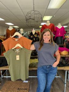 T21020 Solid short sleeve top featuring stud detail at sleeves
