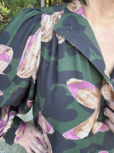 Load image into Gallery viewer, Print long puff sleeve top with a high neckline and button detail at front.