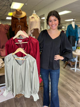 Load image into Gallery viewer, T18854 Satin v-neck long sleeve top featuring pleated detail along neckline