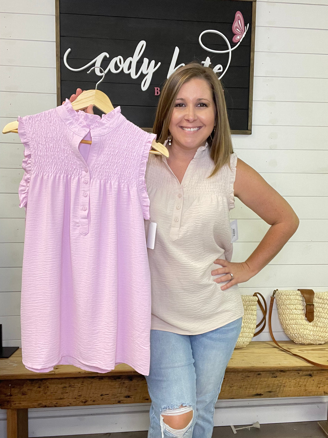 SW253438 Smocked sleeveless top with buttons