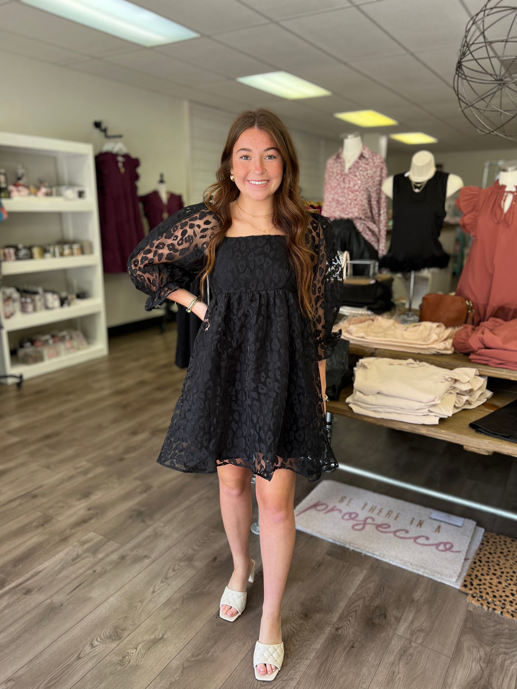 D18981 Animal print square neck 3/4 sleeve mini dress featuring ruffle detail at sleeves