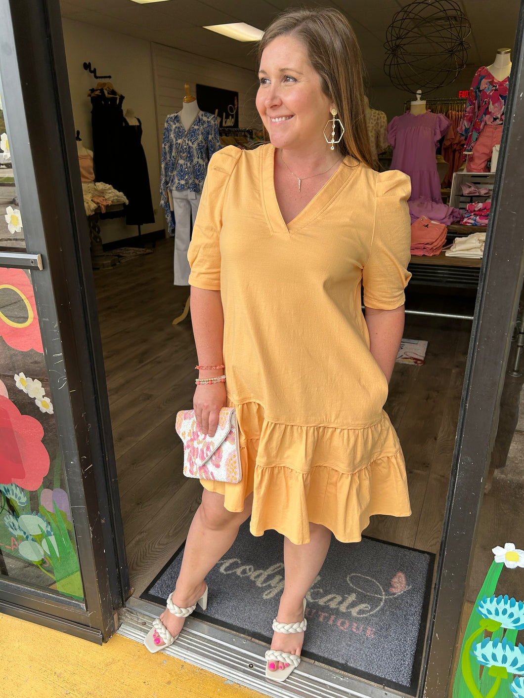 D19839 v neck half sleeve tiered dress featuring pockets at the side