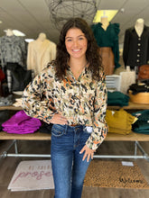 Load image into Gallery viewer, T19292 Print v-neck button up collared long sleeve top featuring tulip hem