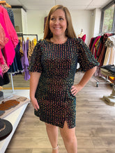 Load image into Gallery viewer, D19504 Glittery sequin bubble sleeve mini dress featuring open back detail. Bow closure at back neck. Invisible zipper at back.