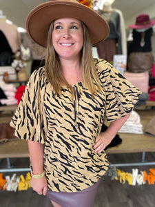 T19318 Animal print round neck puff sleeve top featuring self tie at front