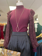 Load image into Gallery viewer, T19414 Mock neck long sleeve top featuring contrast metallic sleeves with ruffle detail